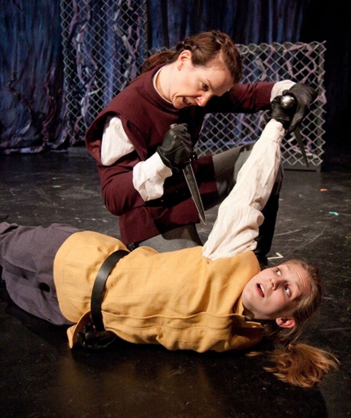 Macbeth (Kathrynne Wolf) defeats Young Seyward (Gillian N. Humiston) at 